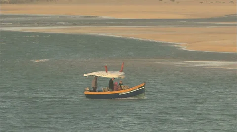A boat sailing along a river Stock Footage 38625438