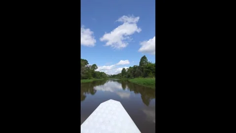 Boat sailing in Amazon rainforest landscape in Amazonas river, forest trees. Stock Footage 280205086