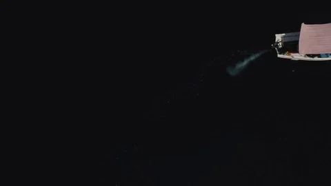 Boat sailing in dark water Stock Footage