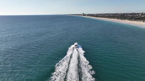 Boat sailing down Perth coast aerial 4k Australia Stock Footage 265905472