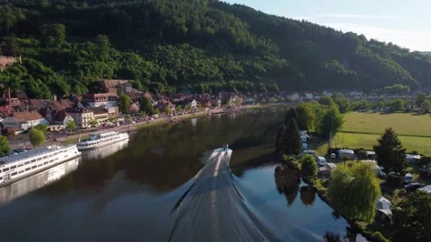 The boat is sailing fast on the river near the city Stock Footage 155188205