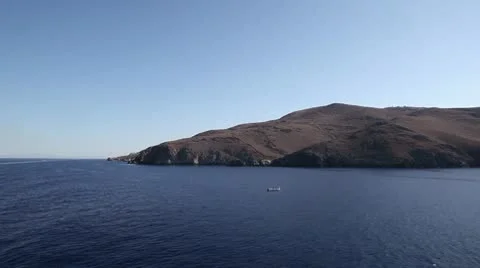 Boat sailing by island Stock Footage 8847769