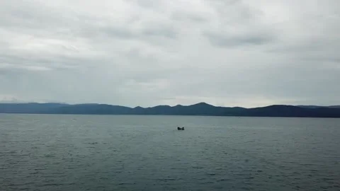 A boat sailing on a lake Stock Footage 218381141