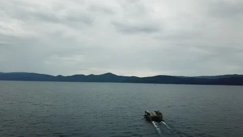 A boat sailing on a lake Stock Footage 218381146