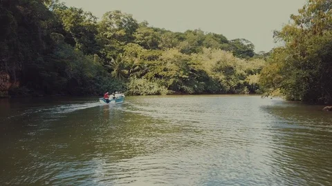 Boat sailing on a river Video stock 100762713