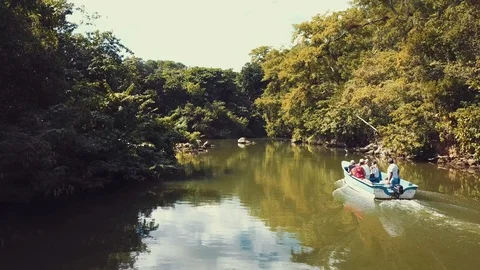 Boat sailing on a river Stock Footage 100763904