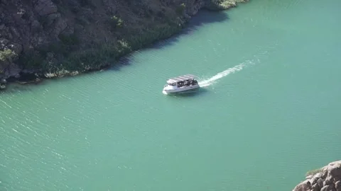 A boat sailing on the river Stock Footage 257597216