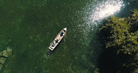 Boat sailing on river through the Amazon region Stock Footage 162521194