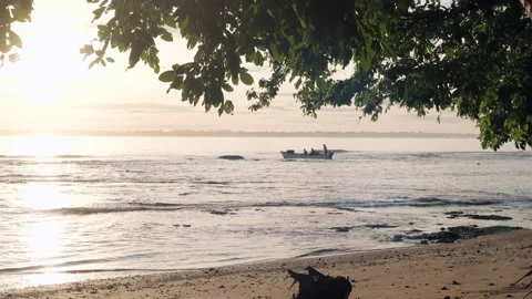 A Boat Sailing at Sunrise Stock Footage 202294953