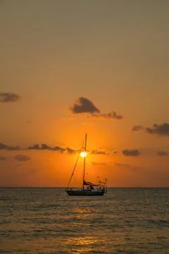 Boat sailing sunset Stock Photos