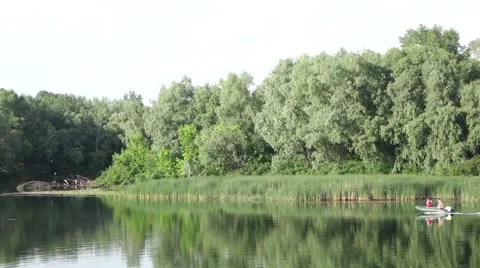 The boat sails along the river Stock Footage 56606799