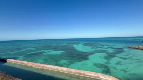 Boat sails around Garden Key. View from Fort Jefferson. Dry Tortugas NP, Florida Stock Footage 339600349