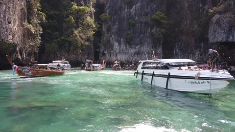 Boat sails from cave near  Phi Phi islands, Thailand. Stock Footage 129151642