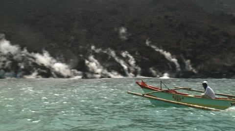 Boat Sails Close To Active Lava Flow Stock Footage 12144003
