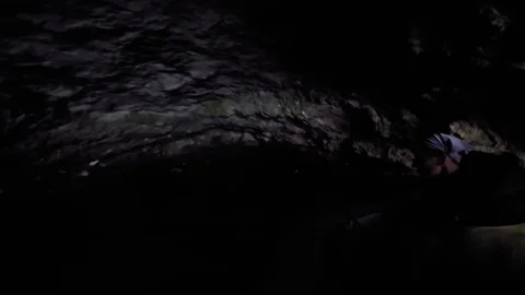 Boat sails in a dark cave Video stock 102018303