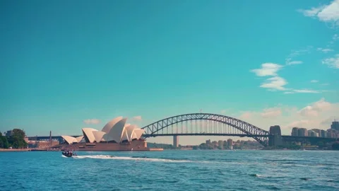 Boat sails with Opera House and Harbour Bridge ,Australia 18/4/2024 Stock Footage 287976635