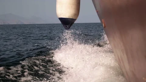 The boat sails on the sea, the ship cuts through the water in the ocean Stock Footage 235936327