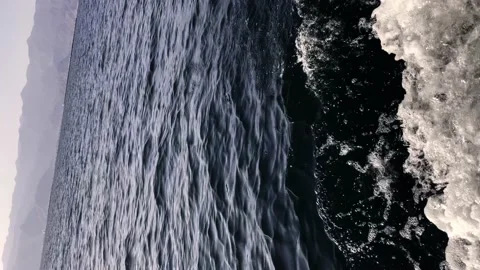 The boat sails on the sea, the ship cuts through the water in the ocean Stock Footage 238548443