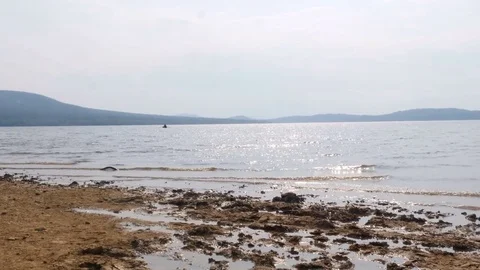 Boat sails to the shore Stock-Footage 80043777