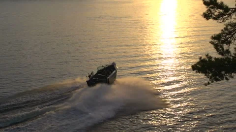 The boat sails in the sunset Stock Footage 49684416