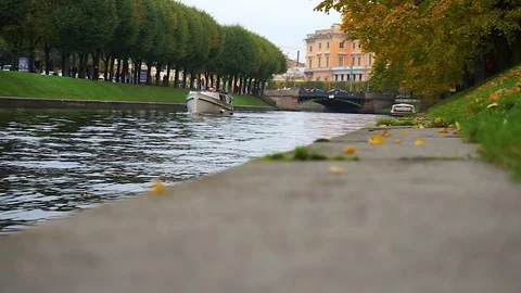 The boat sails through the canal Stock Footage 73766962