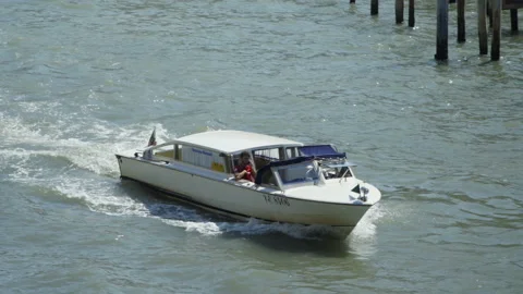 Boat sails through the canals of venice, Italy 4K Stock Footage 201410837