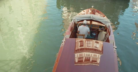 Boat sails under a bridge, June 2020, Venice, Italy Video stock 141693130