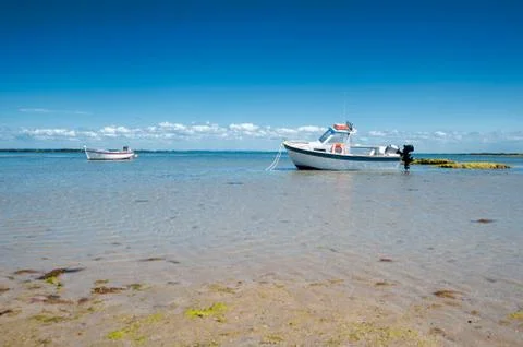 Boat on sand Stock Photos