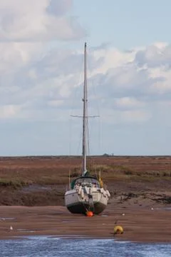 Boat on sand Stock Photos