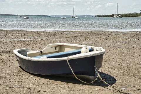 Boat on a sandy beach Foto stock
