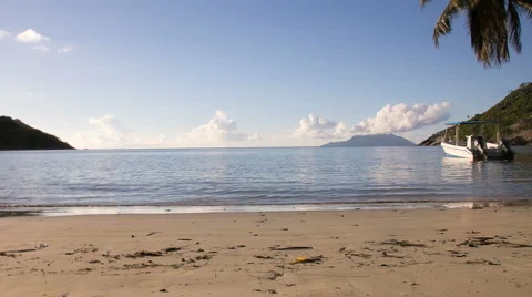 Boat at Sandy Beach // Seychelles HD Stock Footage 43133391