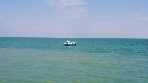 Boat in the sea Stockbeeldmateriaal 255148953