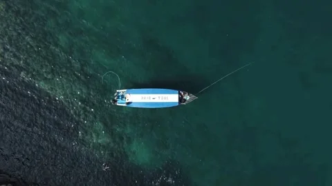 Boat on sea view from sky with drone camera. blue and white boat Stock Footage 287749367