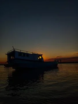 Boat in shadow 스톡 사진