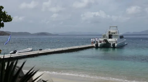 Boat from shore, moored at dock, medium Stock Footage 23810724