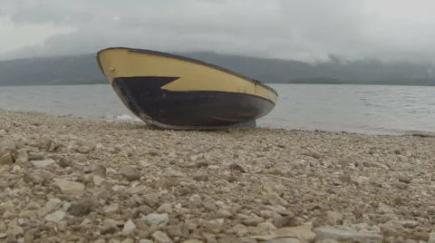 Boat on shore, winter, clouds, medium shot Stock Footage 41755114