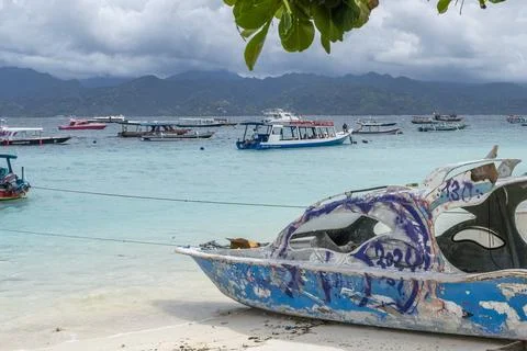 Boat is sitting on the beach Stock Photos