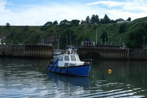 Boat in small harbor Stock-Fotos