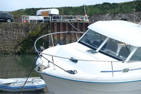 Boat in small harbor Stock Photos
