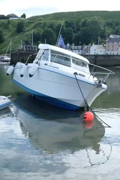 Boat in small harbor Foto stock