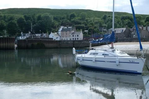 Boat in small harbor 库存照片