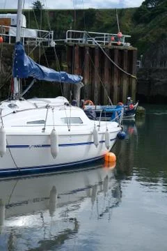 Boat in small harbor Stock Photos