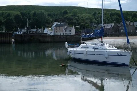 Boat in small harbor Stock Photos