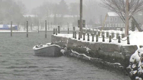 Boat in snowstorm Stock Footage 35296704