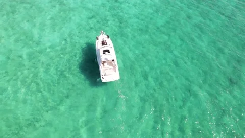 Boat speeding in the Bahamas beach Stock Footage 232437535