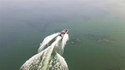 Boat speeding off Stock Footage 139152931