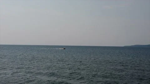 BOAT SPEEDING ON THE LAKE Stock Footage 158452925