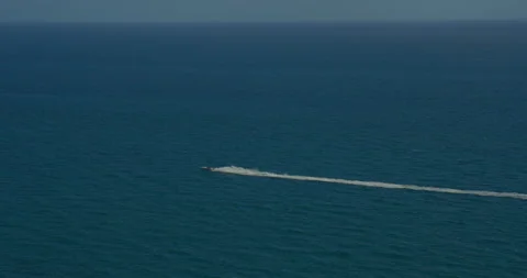 Boat Speeding Pass by through Ocean Stock Footage 175258899