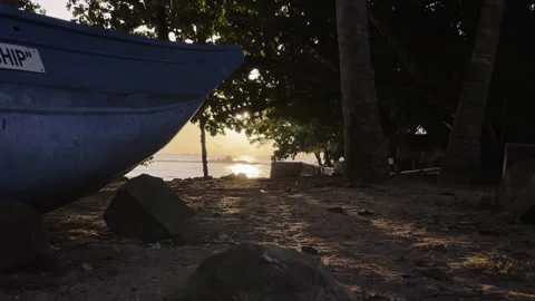 The boat is standing on the seashore at sunset Stock Footage 219569033