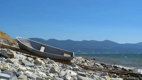 Boat on the stone seashore 4K Stock-Footage 137925347